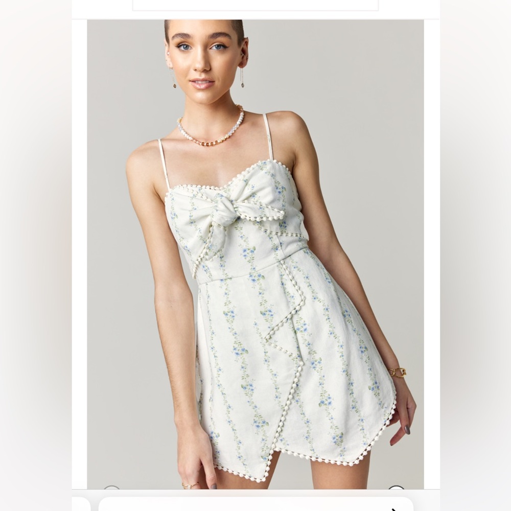 Francesca’s Camila Asymmetrical Floral Romper